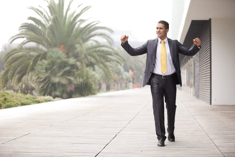 Confident businessman walking