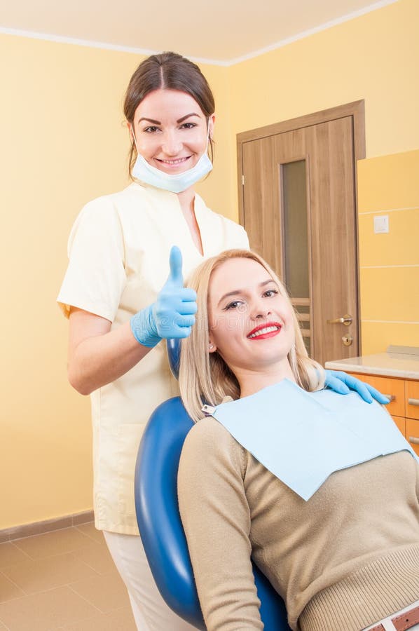 Confident dentist nurse stock image. Image of hygienist 53500553