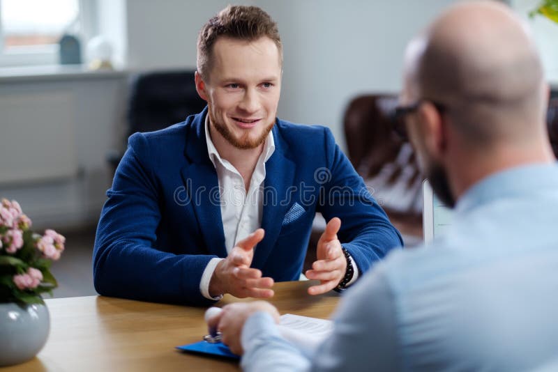 Confident man attending job interview