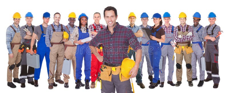 Confident manual workers against white background
