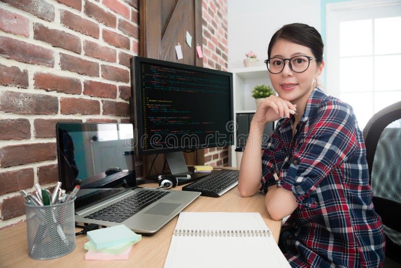 Confident professional female programmer worker royalty free stock photo