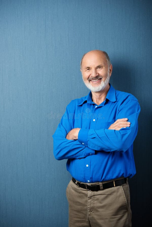 Confident senior male teacher stock images