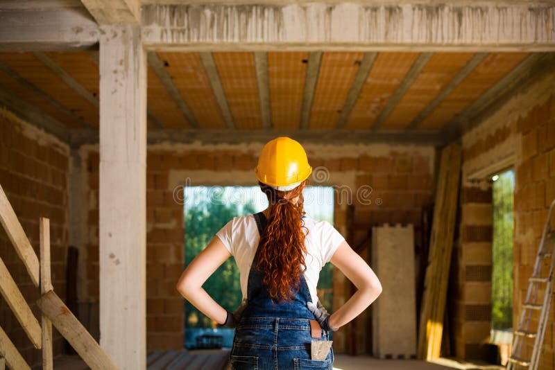 Confident Woman Bricklayer stock images