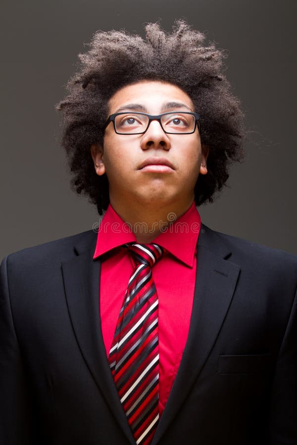 Confident young teenager with afro