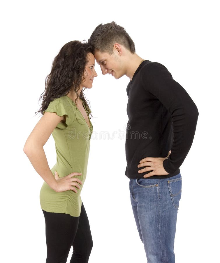 Confrontation - young standing couple royalty free stock images