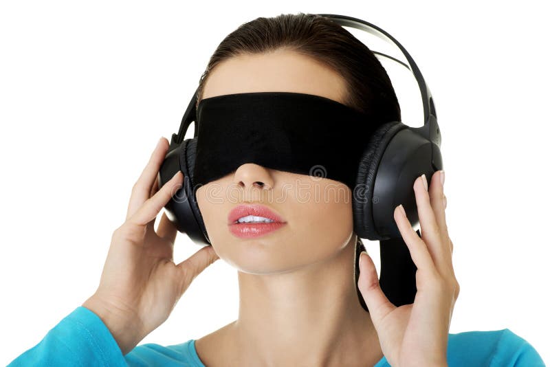 confused blindfolded woman on a white background Stock Photo