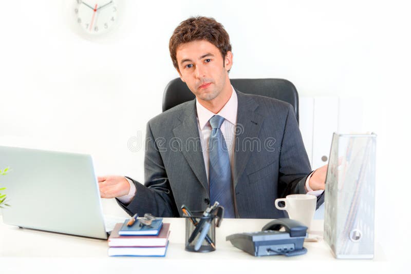 Young Man Sitting At Desk And Typing On Laptop Stock Image Image