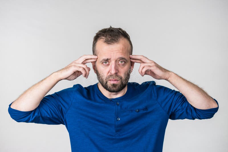 Confused man thinking stock photo. Image of pointing - 138379028