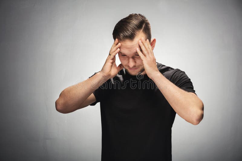 Confused and troubled young man. stock photography Confused and troubled young man. stock photography