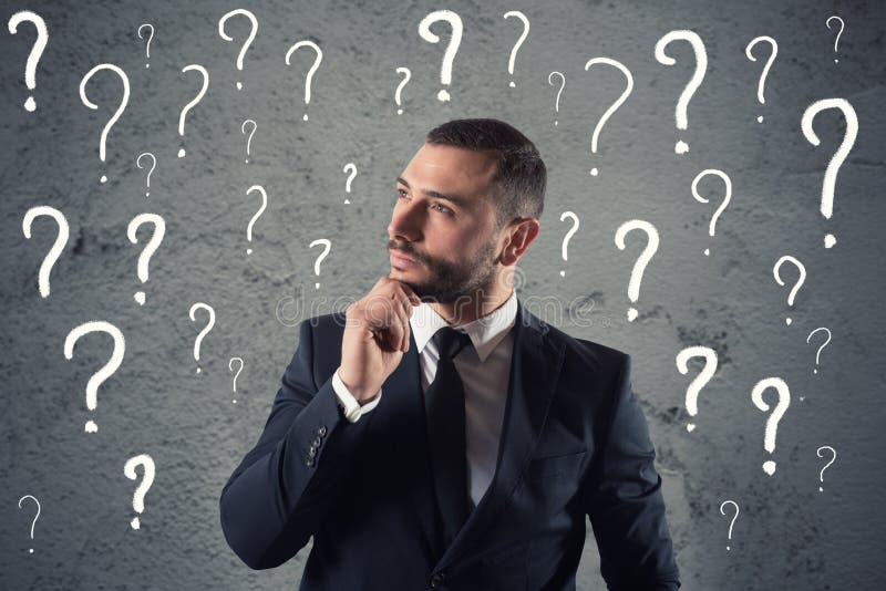 Confused и задумчивый бизнесмен потревожился о будущем стоковая фотография rf Confused и задумчивый бизнесмен потревожился о будущем стоковая фотография rf