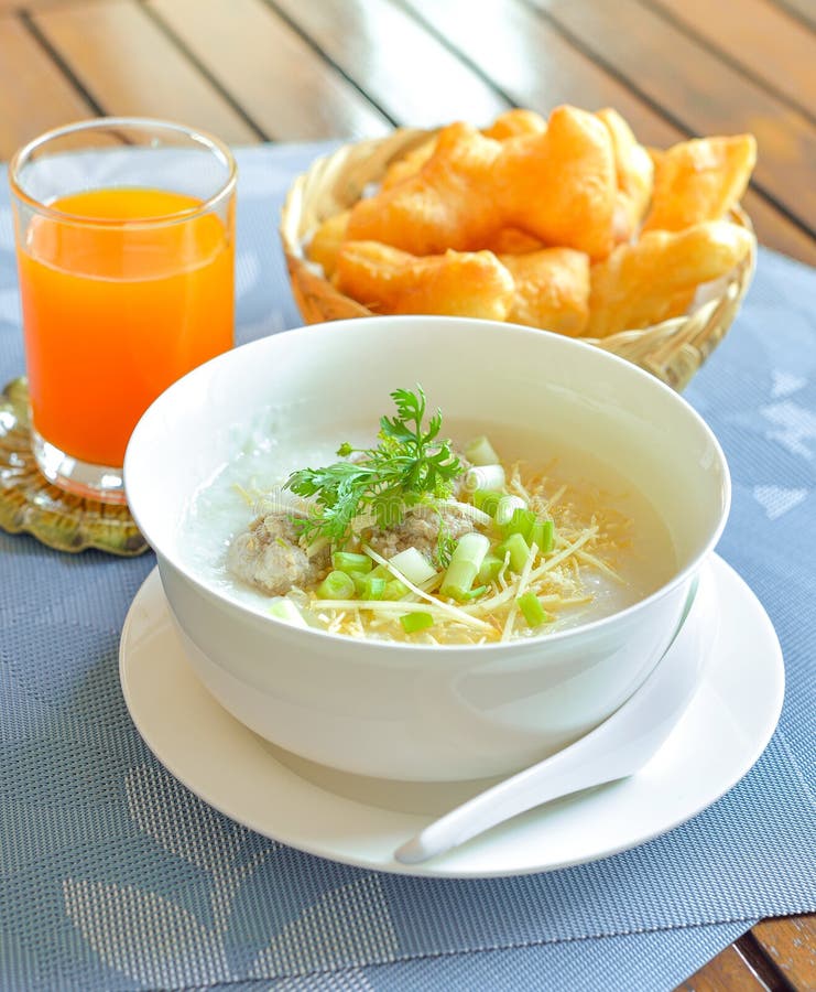Congee with Minced Pork Served Slice Ginger Coriander and Egg ,Asian