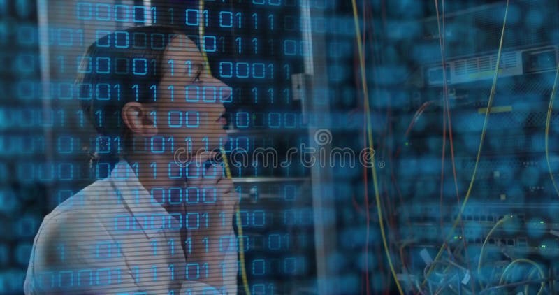 Connecting cable woman IT tech wearing headphones beside network switch in server room, copy space stock photo