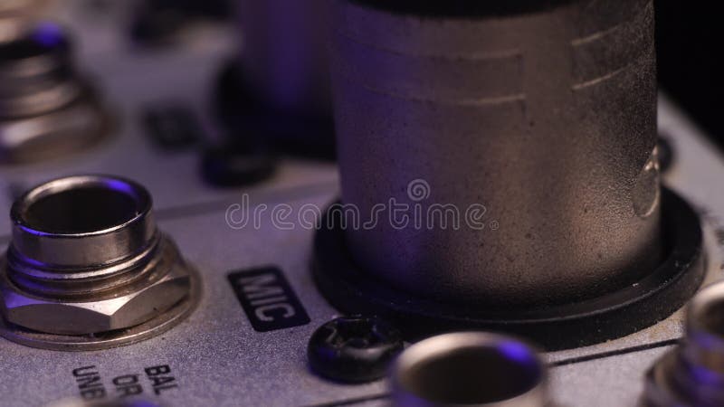 Connecting Microphone Audio Cable With Mixer Console, XLR Connector, Close Up stock video footage