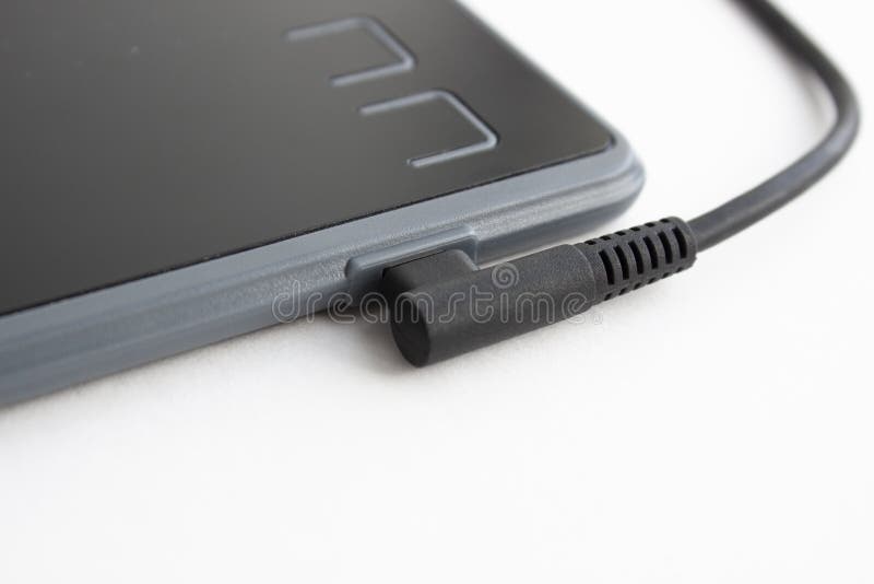 Connector for a graphics tablet. Micro USB charging input royalty free stock photos