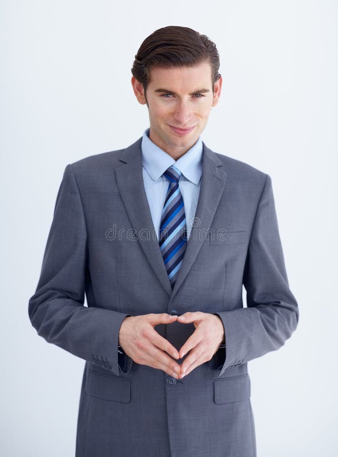 Conniving Businessman a Conniving Young Businessman with His Fingers Conniving Businessman a Conniving Young Businessman with His Fingers