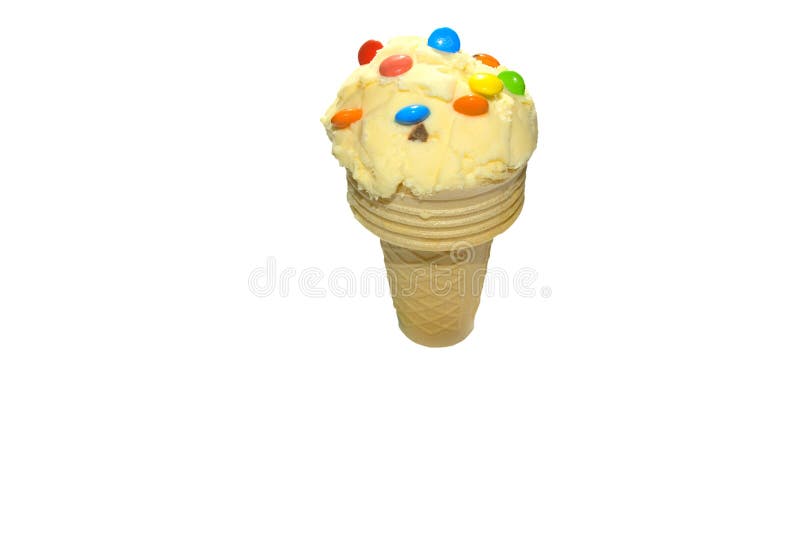 Icream cone with colourful lollies on top isolated on a white background. Icream cone with colourful lollies on top isolated on a white background