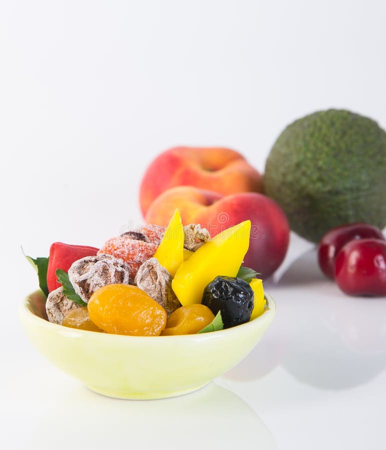 Conserve de fruits et fruits secs Casse-croûte de nourriture sur un fond image stock Conserve de fruits et fruits secs Casse-croûte de nourriture sur un fond image stock