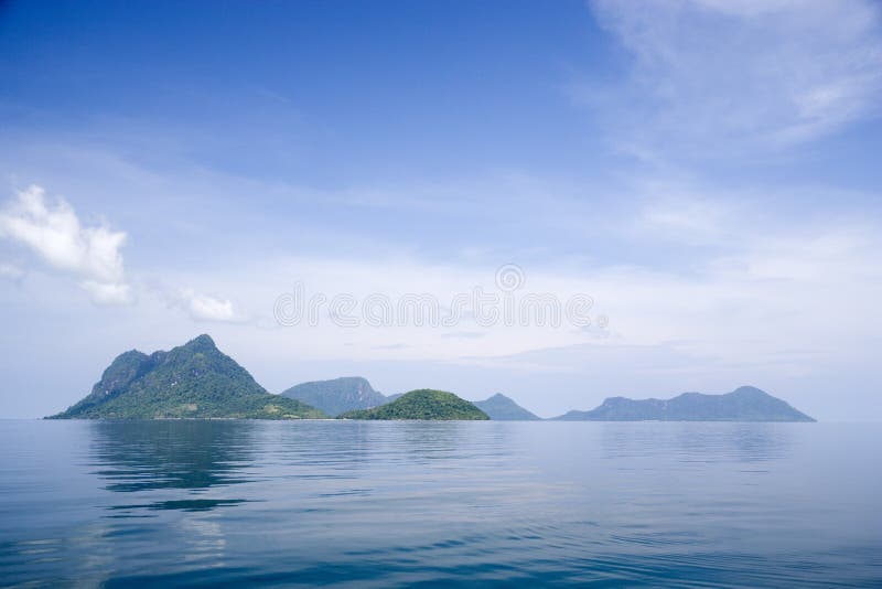 Image of remote Malaysian tropical islands that were formerly the rim of a volcano, now extinct. Image of remote Malaysian tropical islands that were formerly the rim of a volcano, now extinct.