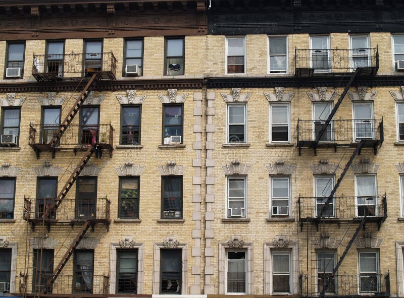 New York City apartment building with fire escapes. New York City apartment building with fire escapes.