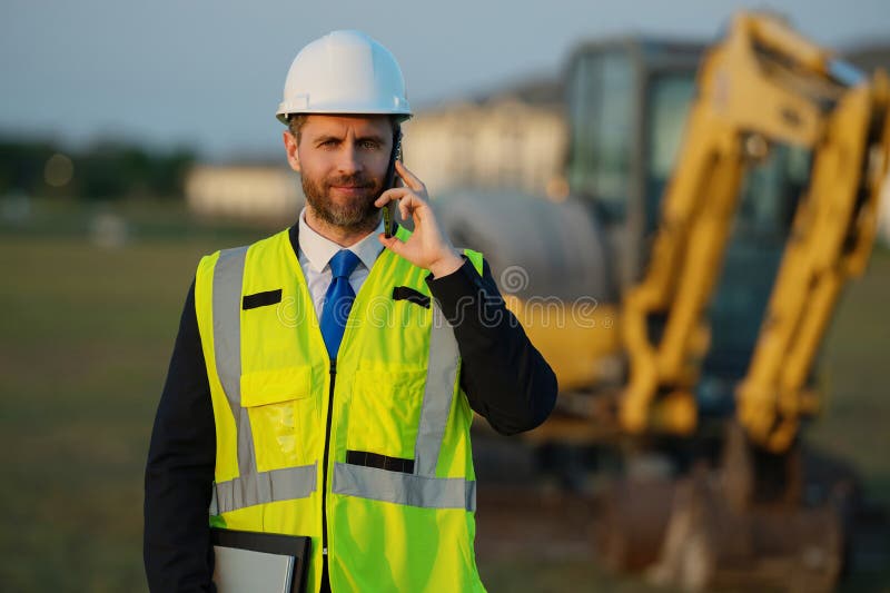 Construction Business Owner in Helmet at Building Site, Copy Space