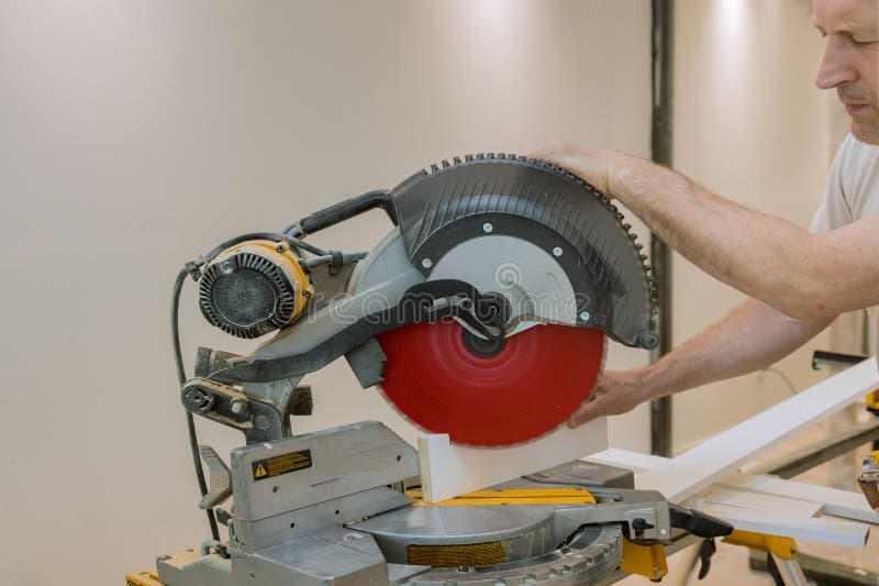 Construction Details of Carpenter Using Circular Saw for Cutting Wooden