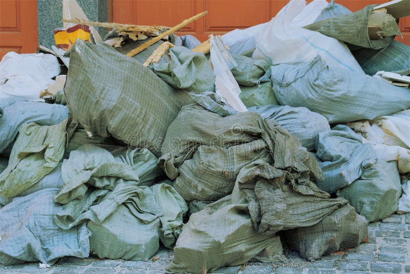 Construction Garbage after Building Repair in Bags. Removal of Debris