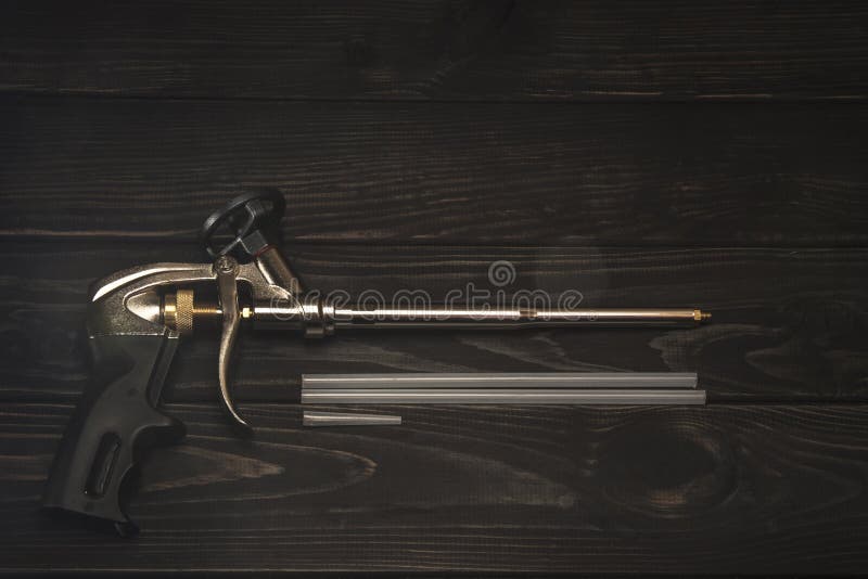 Construction Foam Gun Teflon Coated Construction Gun Stock Photo