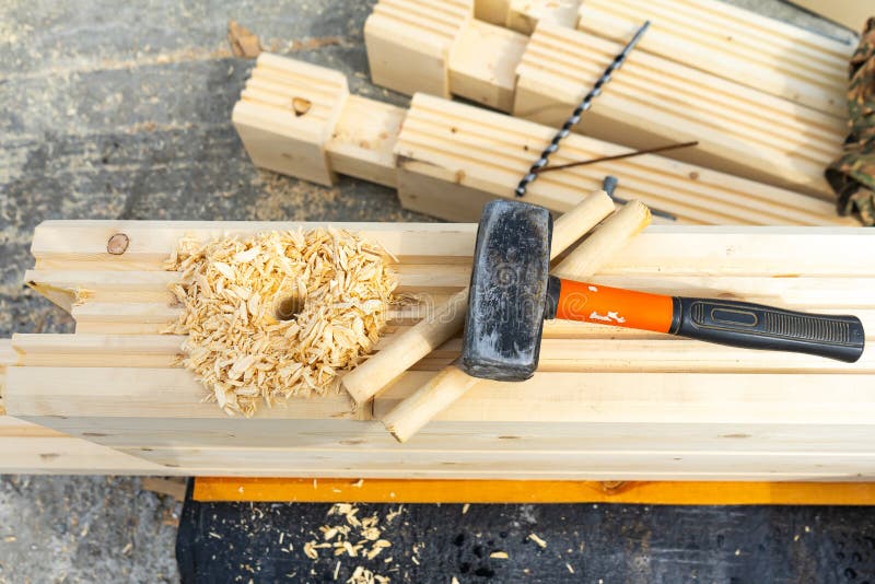 Construction of the House from a Bar. Drilling Holes and Clogging of