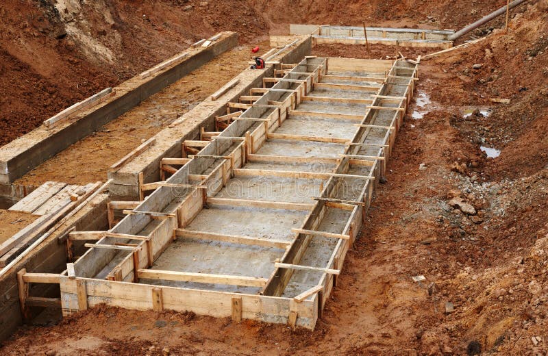 Construction of an industrial building foundation stock photo
