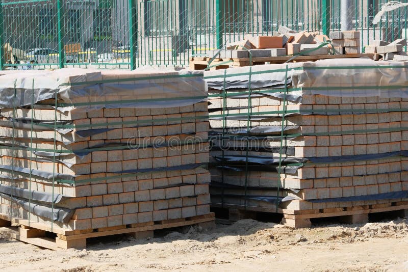 Construction Materials. Pile of Gray Bricks at Construction Site