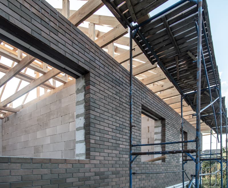 The Construction of Metal and Boards Near the Wall Stock Photo Image