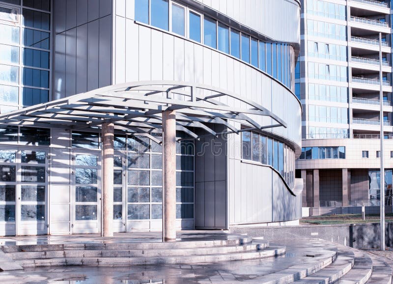 Construction of a modern building with windows and arched roof, industry stock image Construction of a modern building with windows and arched roof, industry stock image