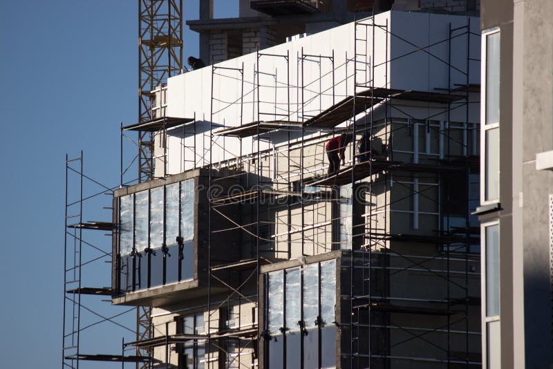 Construction of a modern residential building, the final work before the settlement of residents. Final preparations before the stock photography