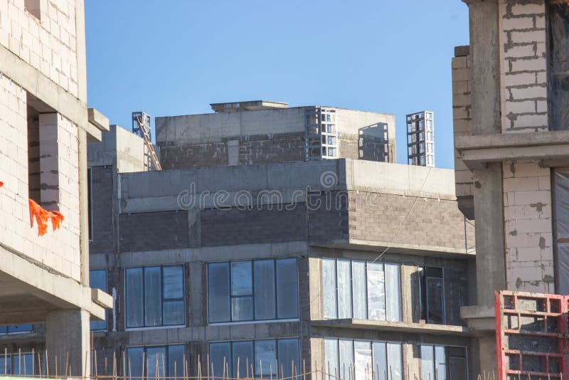 Construction of a modern residential building, the final work before the settlement of residents. Final preparations before the royalty free stock image