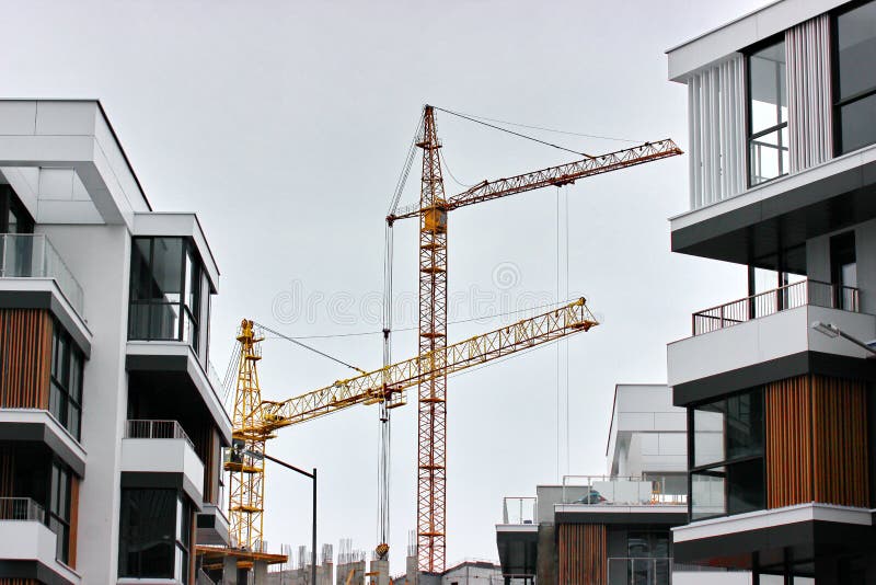 Construction of modern residential buildings. the combination of different materials and textures in the design. convenient layout stock images