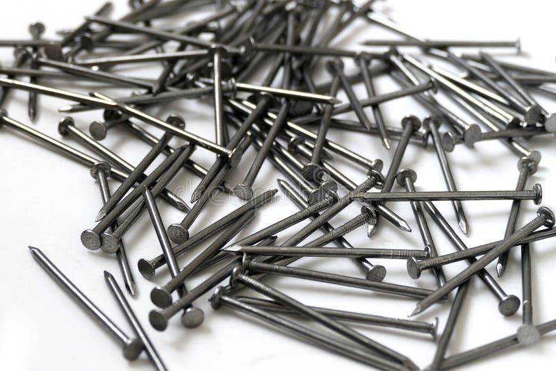 Construction Nails, A Large Amount Of Nails On A White Background Stock Image - Image of construction, industrial: 179980681
