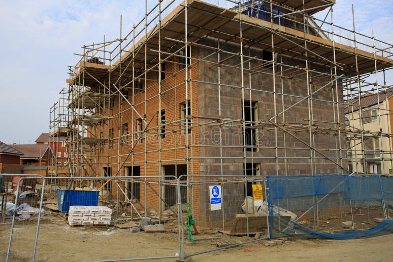 Construction of new houses with scaffolding