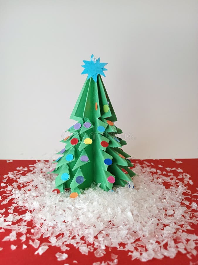Construction Paper Christmas Tree on a White and Red Background and