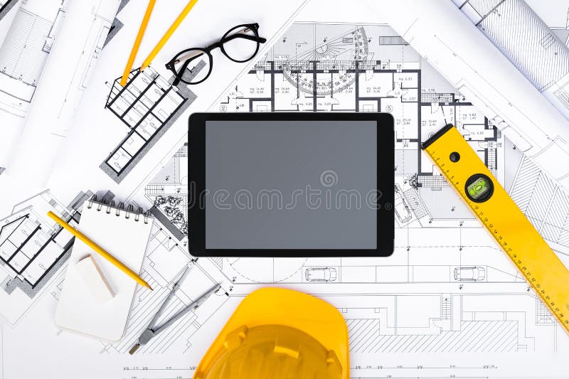 Construction Plans with Tablet, Drawing and Working Tools Stock Photo