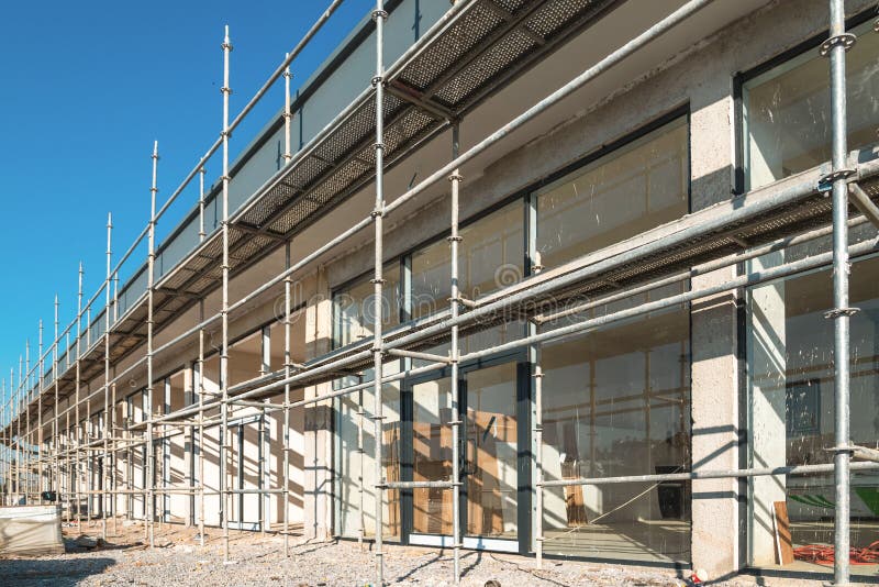 Construction Scaffolding Built on a New Apartment Building. New