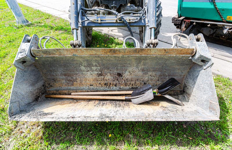 Construction Shovels in the Loader Tractor Bucket Stock Image Image