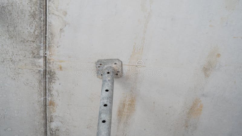 Construction site background - shell construction on a construction site with bare shuttered concrete walls and fallen ceiling stock image