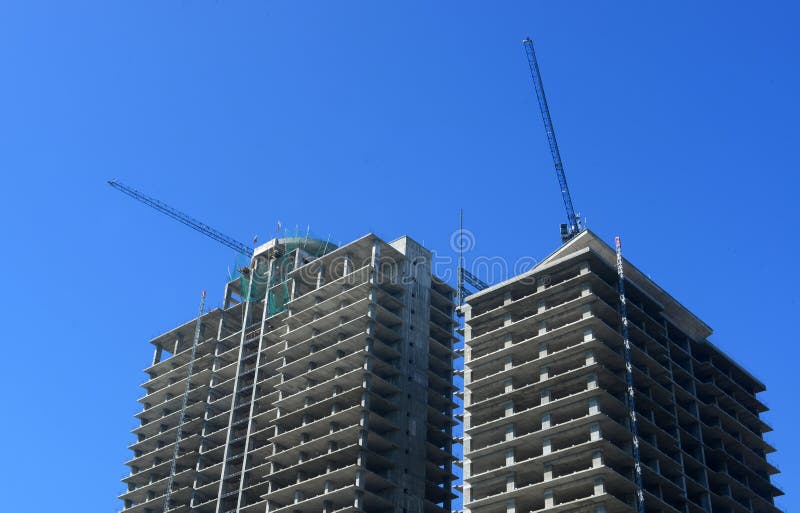 Construction site with tower crane over blue sky, Sept 30, 2014, Sofia, Bulgaria