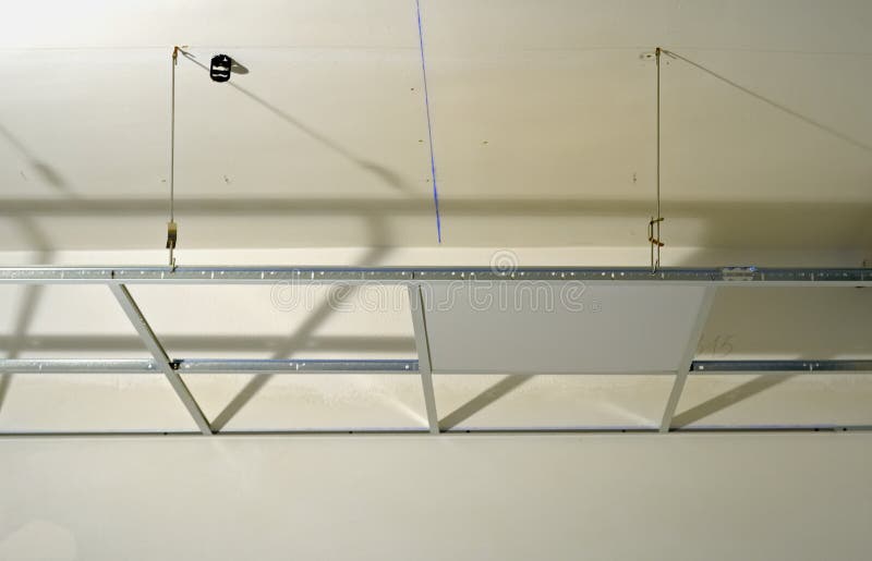 Construction of the structure of a suspended ceiling stock images