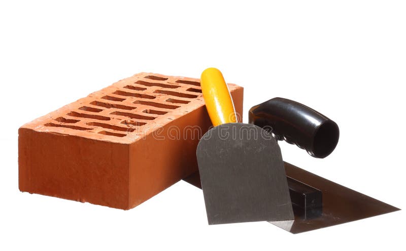 Construction tools and a brick