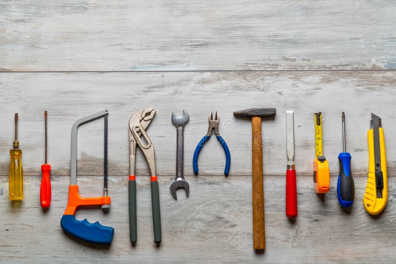 Construction tools on rustic wooden stock photo Construction tools on rustic wooden stock photo