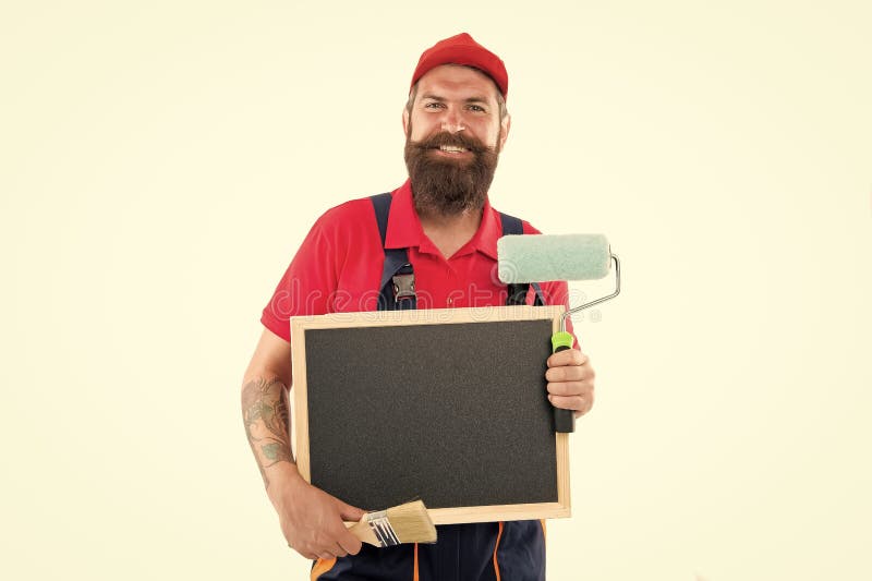 Construction Training Course. Happy Painter Hold Blackboard in Training