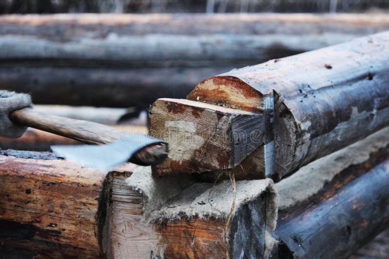 Construction of a Wooden House on a Pile Foundation. Stock Photo