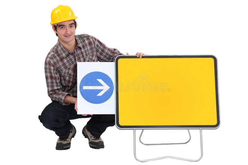 Construction worker with an arrow royalty free stock photography Construction worker with an arrow royalty free stock photography