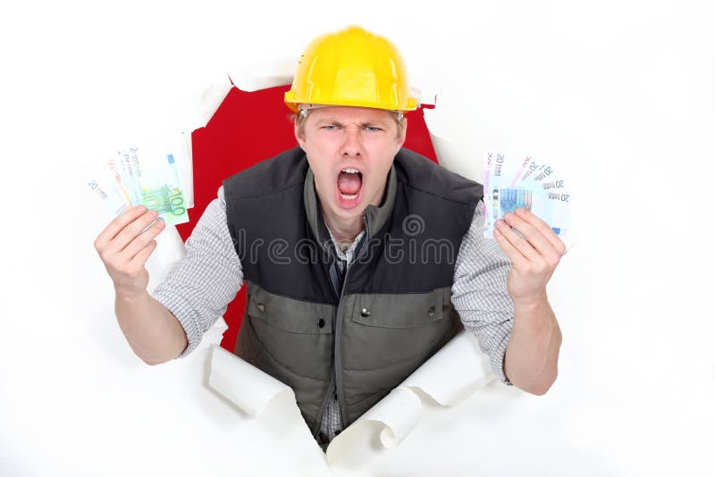 Construction worker with cash. royalty free stock image Construction worker with cash. royalty free stock image